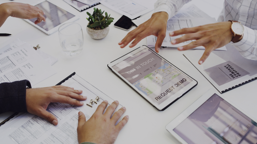 A group of people mapping out a custom software plan